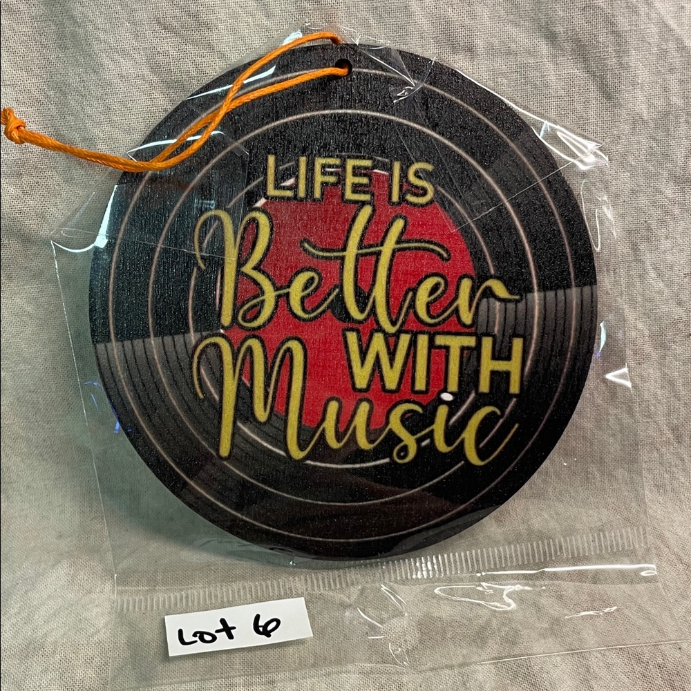 Lot 6 - Music-Themed Christmas vinyl  ornament with Red and Yellow Accents